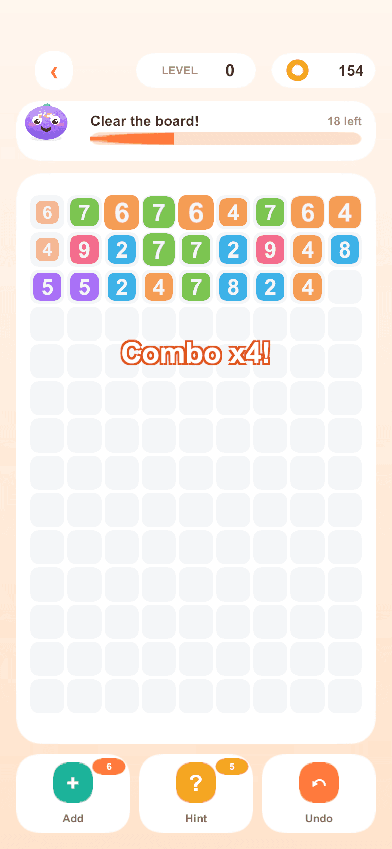 Gameplay — a pyramid stage of make-ten candy tiles, partners sharing a colour.